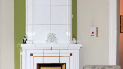 Ein hochwertig gekachelter Kamin bringt Wärme für das gesamte Geschoss Ein hochwertig gekachelter Kamin bringt Wärme für das gesamte Geschoss