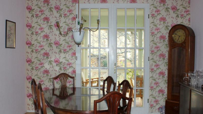 Der Salon mit Blick zum Garten Der Salon mit Blick zum Garten