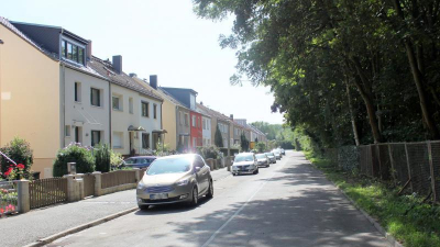 einen Reihenhauskomplex bildend einen Reihenhauskomplex bildend